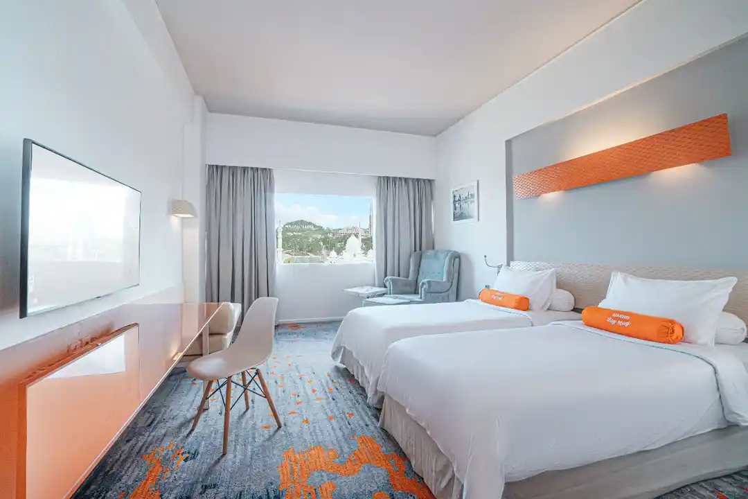 Kamar hotel modern di kawasan Nagoya Batam dengan fasilitas lengkap